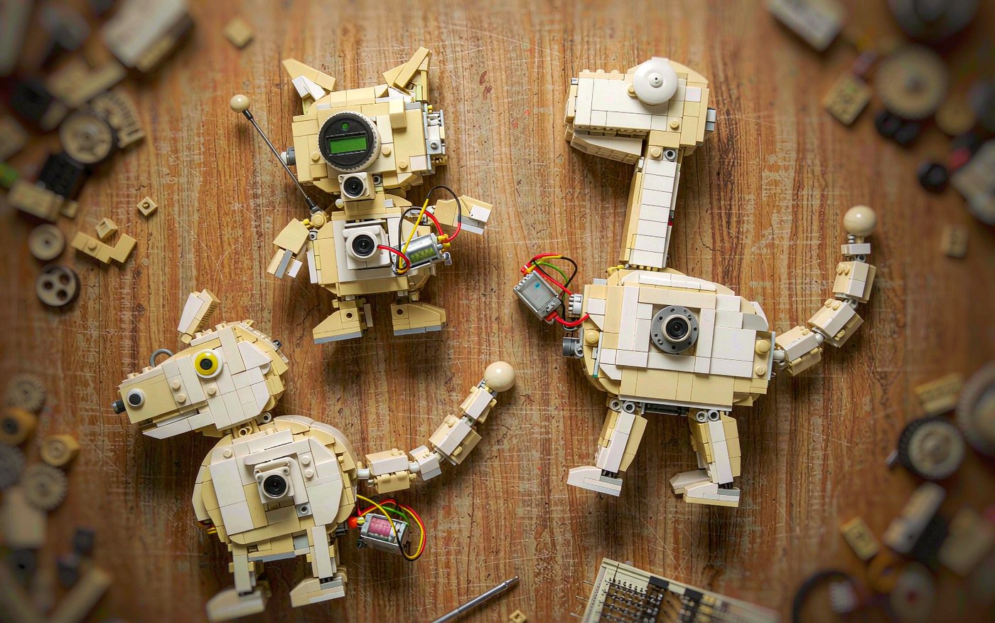 Three completely different AI creatures built by three children from the same AI building block kit