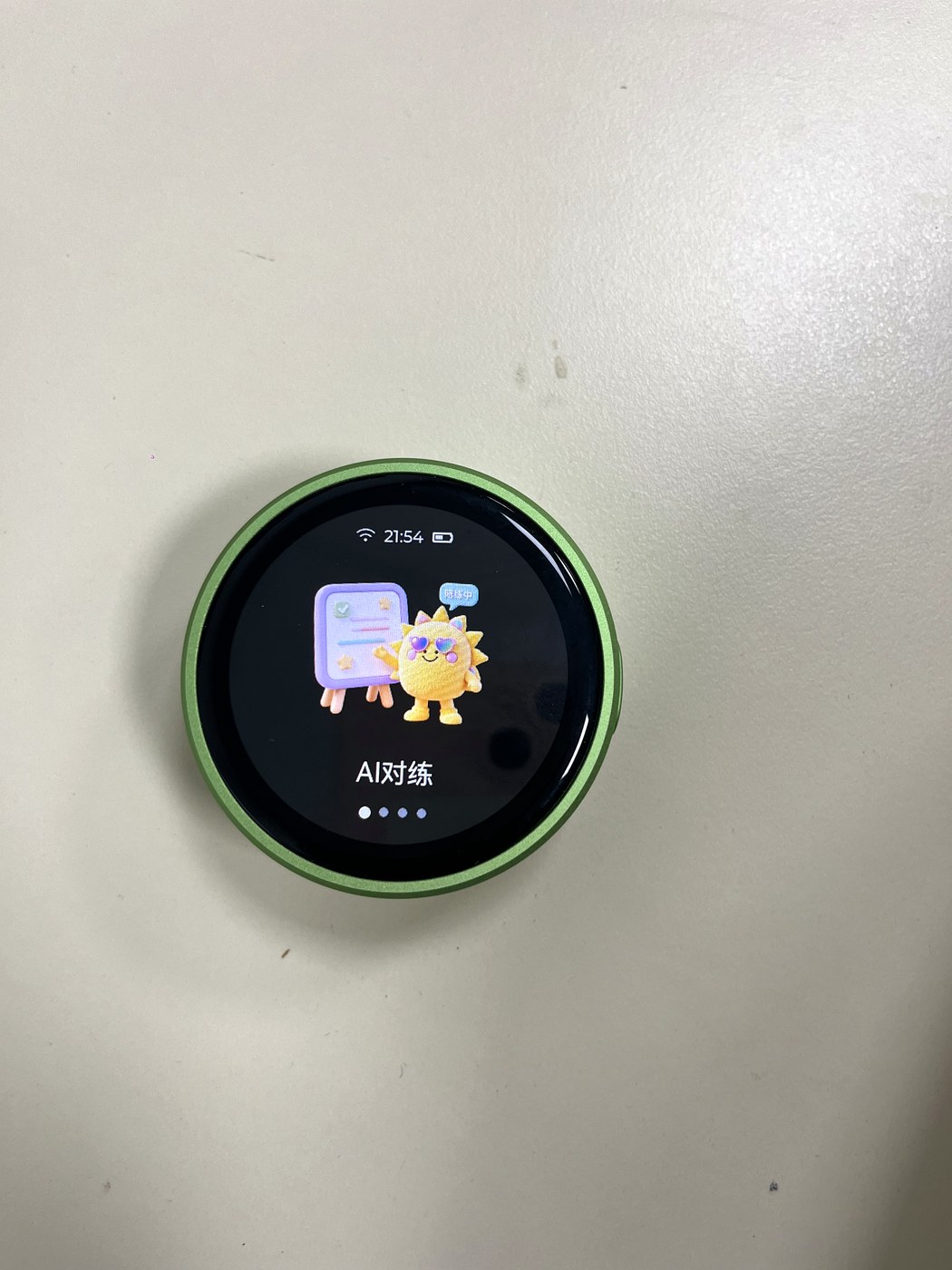 AI speaking practice device held in one hand